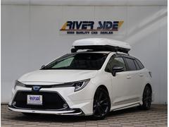 カローラツーリング ハイブリッド ダブルバイビー 1オーナー モデリスタエアロ 9インチディスプレイオーディオナビフルセグ DVD再生バックカメラ デジタルインナーミラー ハーフレザーシートヒーター レーダークルーズ LEDライト フォグライト 中古車画像