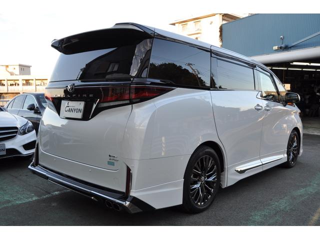 ヴェルファイアハイブリッド Ｚ　プレミア　Ｅ－ＦＯＵＲ・モデリスタエアロ・ムーンルーフ・ユニバーサルステップ・１３．２後席ディスプレイ・デジタルインナーミラー・サイドエンブレムイルミネーション・１オーナー・禁煙車・保証書（7枚目）