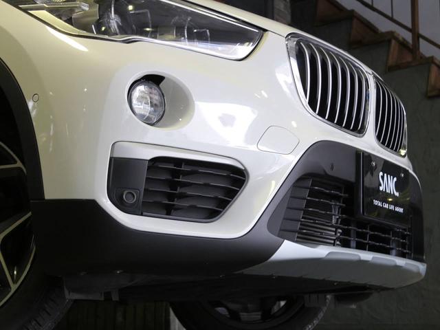 Ｘ１ ｘＤｒｉｖｅ　２０ｉ　ｘライン　禁煙　パノラマガラスサンルーフ　リアビューカメラ　Ｙスポーク１８インチアルミホイール　ＬＥＤドアプロジェクター　オートマチックテールゲート　ドライビングパフォーマンスコントロール　ドライビングアシスト（79枚目）