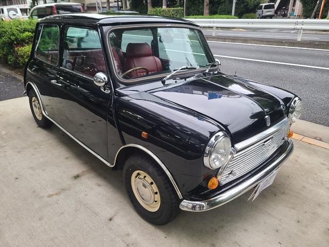 ＭＩＮＩ クーパー１．３　オールペイント済　赤革調シートカバー　コーティング施工車　ウッドハンドル　内外装仕上げ済　前後メッキバンパー　メッキドアミラーカバー　ＣＤデッキ　ＥＴＣ　記録簿　スペアキー（2枚目）