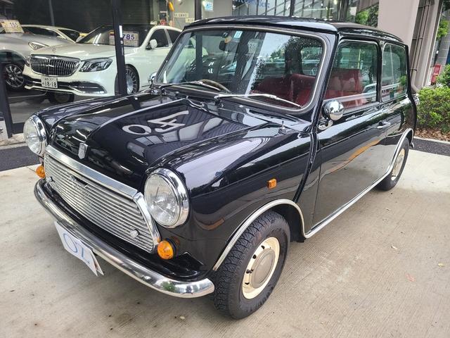 ＭＩＮＩ クーパー１．３　オールペイント済　赤革調シートカバー　コーティング施工車　ウッドハンドル　内外装仕上げ済　前後メッキバンパー　メッキドアミラーカバー　ＣＤデッキ　ＥＴＣ　記録簿　スペアキー（3枚目）