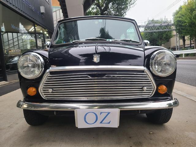 ＭＩＮＩ クーパー１．３　オールペイント済　赤革調シートカバー　コーティング施工車　ウッドハンドル　内外装仕上げ済　前後メッキバンパー　メッキドアミラーカバー　ＣＤデッキ　ＥＴＣ　記録簿　スペアキー（5枚目）