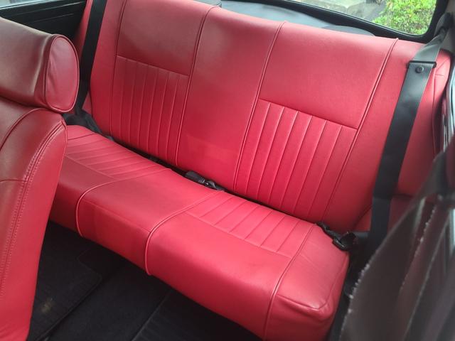 ＭＩＮＩ クーパー１．３　オールペイント済　赤革調シートカバー　コーティング施工車　ウッドハンドル　内外装仕上げ済　前後メッキバンパー　メッキドアミラーカバー　ＣＤデッキ　ＥＴＣ　記録簿　スペアキー（13枚目）