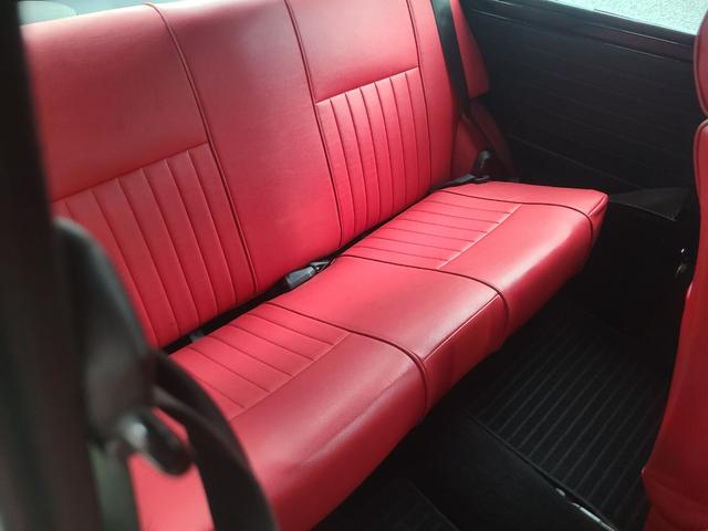 ＭＩＮＩ クーパー１．３　オールペイント済　赤革調シートカバー　コーティング施工車　ウッドハンドル　内外装仕上げ済　前後メッキバンパー　メッキドアミラーカバー　ＣＤデッキ　ＥＴＣ　記録簿　スペアキー（14枚目）