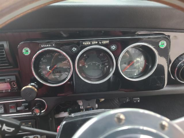 ＭＩＮＩ クーパー１．３　オールペイント済　赤革調シートカバー　コーティング施工車　ウッドハンドル　内外装仕上げ済　前後メッキバンパー　メッキドアミラーカバー　ＣＤデッキ　ＥＴＣ　記録簿　スペアキー（20枚目）