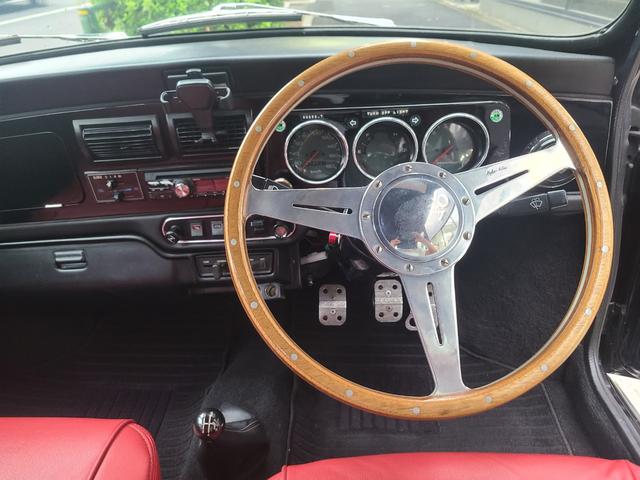 ＭＩＮＩ クーパー１．３　オールペイント済　赤革調シートカバー　コーティング施工車　ウッドハンドル　内外装仕上げ済　前後メッキバンパー　メッキドアミラーカバー　ＣＤデッキ　ＥＴＣ　記録簿　スペアキー（21枚目）