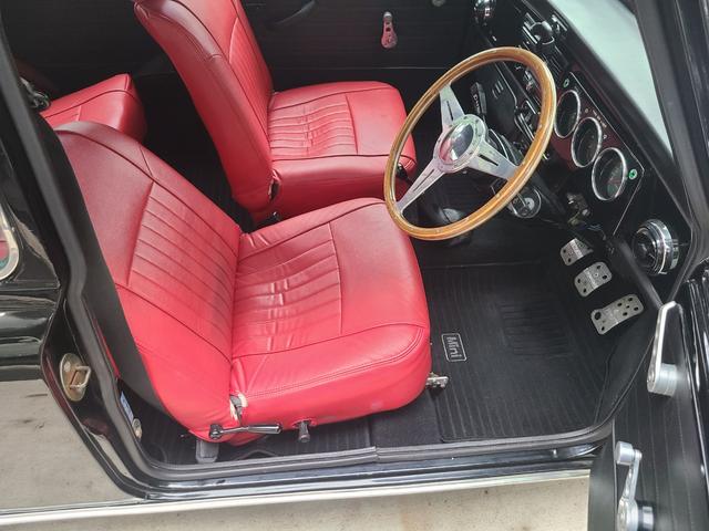 ＭＩＮＩ クーパー１．３　オールペイント済　赤革調シートカバー　コーティング施工車　ウッドハンドル　内外装仕上げ済　前後メッキバンパー　メッキドアミラーカバー　ＣＤデッキ　ＥＴＣ　記録簿　スペアキー（28枚目）