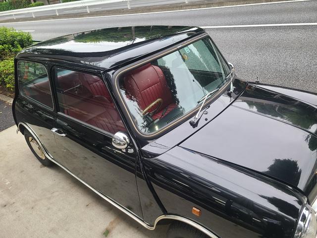 ＭＩＮＩ クーパー１．３　オールペイント済　赤革調シートカバー　コーティング施工車　ウッドハンドル　内外装仕上げ済　前後メッキバンパー　メッキドアミラーカバー　ＣＤデッキ　ＥＴＣ　記録簿　スペアキー（29枚目）