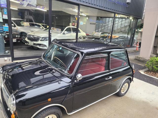 ＭＩＮＩ クーパー１．３　オールペイント済　赤革調シートカバー　コーティング施工車　ウッドハンドル　内外装仕上げ済　前後メッキバンパー　メッキドアミラーカバー　ＣＤデッキ　ＥＴＣ　記録簿　スペアキー（30枚目）