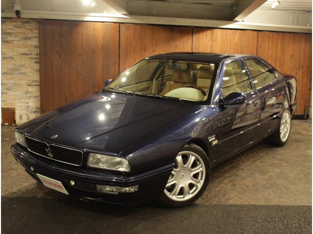 クアトロポルテ エボルツィオーネＶ８コーンズセリエスペチアレ　ディーラー車　左ハンドル　４速ＡＴ車　クオイオレザーシート　シートヒーター付き　純正１７ＡＷ　社外サンルーフ　ラサール製オーバル型時計　七宝焼きＣピラーエンブレム（5枚目）