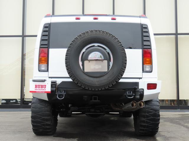 ハマーＨ２ タイプＧ　三井物産ディーラー車　サンルーフ　レザーシート　３列シート　シートヒーター　電動シート　サイドステップ　ＥＴＣ　バックカメラ　オートライト　ＭＫＷクローム２０インチＡＷ　オートエアコン　ナビ　地デジ（7枚目）