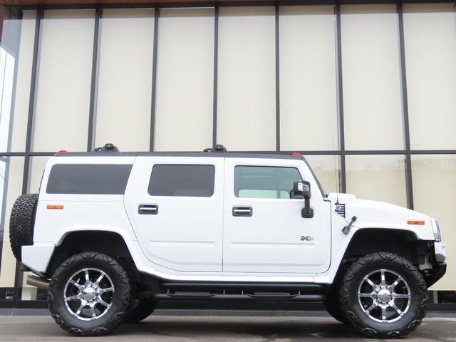 ハマーＨ２ タイプＧ　三井物産ディーラー車　サンルーフ　レザーシート　３列シート　シートヒーター　電動シート　サイドステップ　ＥＴＣ　バックカメラ　オートライト　ＭＫＷクローム２０インチＡＷ　オートエアコン　ナビ　地デジ（8枚目）