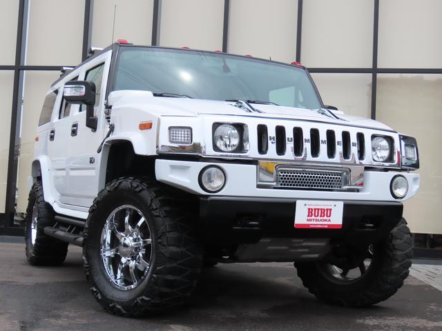 ハマーＨ２ タイプＧ　三井物産ディーラー車　サンルーフ　レザーシート　３列シート　シートヒーター　電動シート　サイドステップ　ＥＴＣ　バックカメラ　オートライト　ＭＫＷクローム２０インチＡＷ　オートエアコン　ナビ　地デジ（9枚目）