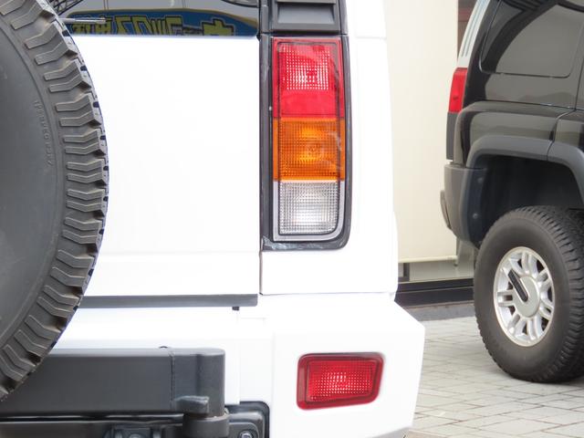 ハマーＨ２ タイプＧ　三井物産ディーラー車　サンルーフ　レザーシート　３列シート　シートヒーター　電動シート　サイドステップ　ＥＴＣ　バックカメラ　オートライト　ＭＫＷクローム２０インチＡＷ　オートエアコン　ナビ　地デジ（19枚目）