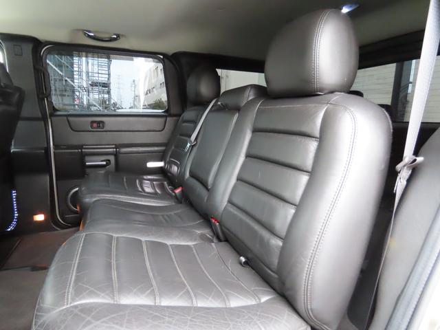 ハマーＨ２ タイプＧ　ディーラー車　左ハンドル　ＥＴＣ　バックカメラ　ドライブレコーダー　社外メモリーナビ　フルセグ　後席モニター　　Ｂｌｕｅｔｏｏｔｈ　レザーシート　電動シート　シートヒーター　社外マフラー　サンルーフ（5枚目）