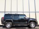 ハマーＨ３ ラグジュアリー　三井物産ディーラー車　レザーシート　横滑り防止　ナビ　ＦＭ　ＡＭ　ＣＤ　ＤＶＤ　１６インチアルミホイール　サンルーフ　オートライト　電動シート（8枚目）