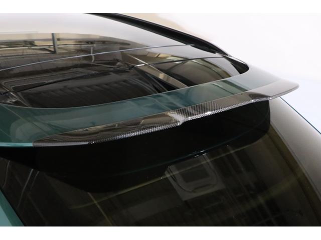 ＤＢＸ ７０７　１オナ　ベージュ革　純正２２インチアルミ　カーボンブレーキ　エアサス　ＬＥＤヘッドライト　クリアテール　ガラスルーフ　電動スポーツプラスシート　前後ベンチレーター　純正ＨＤＤナビ　地デジ（49枚目）