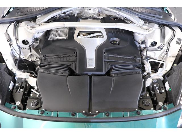 ＤＢＸ ７０７　１オナ　ベージュ革　純正２２インチアルミ　カーボンブレーキ　エアサス　ＬＥＤヘッドライト　クリアテール　ガラスルーフ　電動スポーツプラスシート　前後ベンチレーター　純正ＨＤＤナビ　地デジ（51枚目）