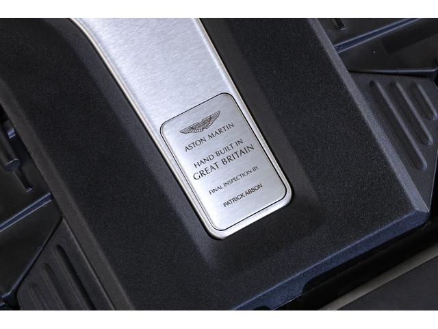 ＤＢＸ ７０７　１オナ　ベージュ革　純正２２インチアルミ　カーボンブレーキ　エアサス　ＬＥＤヘッドライト　クリアテール　ガラスルーフ　電動スポーツプラスシート　前後ベンチレーター　純正ＨＤＤナビ　地デジ（52枚目）