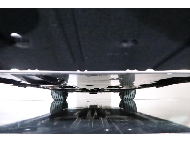 ＤＢＸ ７０７　１オナ　ベージュ革　純正２２インチアルミ　カーボンブレーキ　エアサス　ＬＥＤヘッドライト　クリアテール　ガラスルーフ　電動スポーツプラスシート　前後ベンチレーター　純正ＨＤＤナビ　地デジ（56枚目）