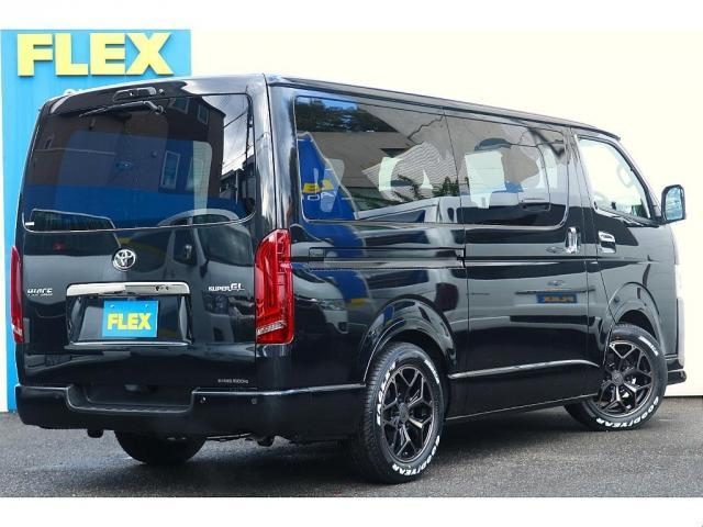 ハイエースバン スーパーGL ダークプライムII BIG-X11インチナビビルトインETC2.0HDMIUSBポートベッドキットフロントスポイラーFLEXオーバーフェンダーネオトレースLEDテールFLEX17インチアルミナスカータイヤローダウン(7枚目)