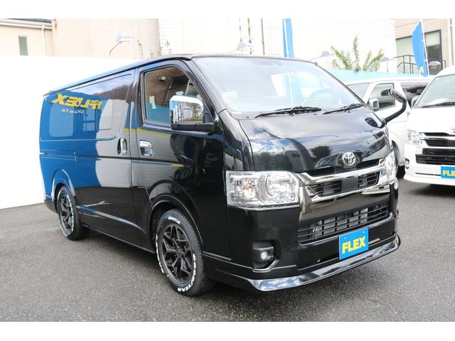 ハイエースバン スーパーGL ダークプライムII BIG-X11インチナビビルトインETC2.0HDMIUSBポートベッドキットフロントスポイラーFLEXオーバーフェンダーネオトレースLEDテールFLEX17インチアルミナスカータイヤローダウン(23枚目)