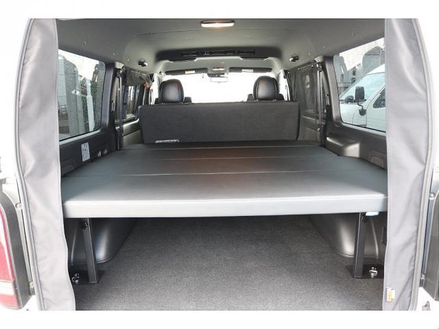 ハイエースバン スーパーGL ダークプライムII RAYS16インチアルミグッドイヤーナスカータイヤフロントスポイラーFLEXLEDテールオーバーフェンダーローダウンカロッツェリアナビETCドライブレコーダーベッドキット防虫ネッリアフィルム(5枚目)