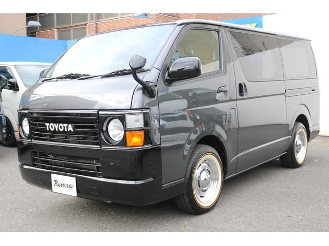 ハイエースバン ロングスーパーＧＬ　丸目フェイスツートンカラーＤＥＡＮ１６インチアルミクラシックオーバルタイヤＢＩＧ－ＸナビＥＴＣフリップダウンモニターメティオサウンドＦＬＥＸシートカバーベッドキット黄木目インテリアパネルステアリング（9枚目）