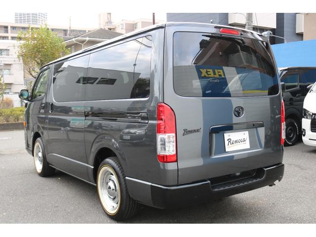 ハイエースバン ロングスーパーＧＬ　丸目フェイスツートンカラーＤＥＡＮ１６インチアルミクラシックオーバルタイヤＢＩＧ－ＸナビＥＴＣフリップダウンモニターメティオサウンドＦＬＥＸシートカバーベッドキット黄木目インテリアパネルステアリング（12枚目）