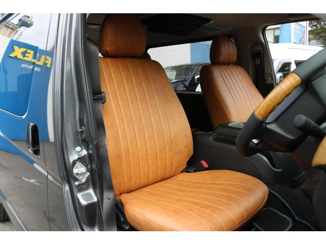 ハイエースバン ロングスーパーＧＬ　丸目フェイスツートンカラーＤＥＡＮ１６インチアルミクラシックオーバルタイヤＢＩＧ－ＸナビＥＴＣフリップダウンモニターメティオサウンドＦＬＥＸシートカバーベッドキット黄木目インテリアパネルステアリング（14枚目）