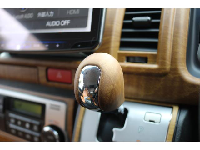 ハイエースバン ロングスーパーＧＬ　丸目フェイスツートンカラーＤＥＡＮ１６インチアルミクラシックオーバルタイヤＢＩＧ－ＸナビＥＴＣフリップダウンモニターメティオサウンドＦＬＥＸシートカバーベッドキット黄木目インテリアパネルステアリング（26枚目）