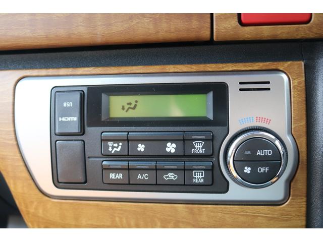 ハイエースバン ロングスーパーＧＬ　丸目フェイスツートンカラーＤＥＡＮ１６インチアルミクラシックオーバルタイヤＢＩＧ－ＸナビＥＴＣフリップダウンモニターメティオサウンドＦＬＥＸシートカバーベッドキット黄木目インテリアパネルステアリング（30枚目）