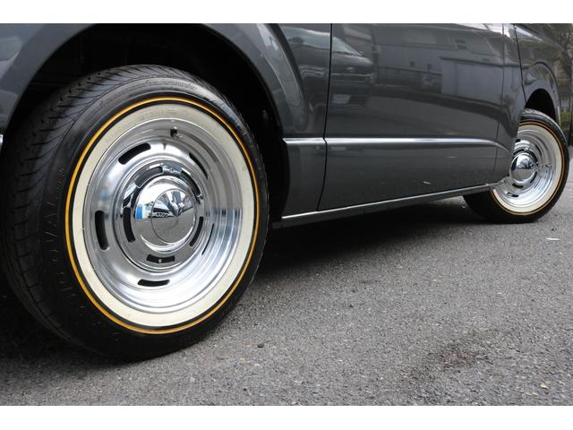 ハイエースバン ロングスーパーＧＬ　丸目フェイスツートンカラーＤＥＡＮ１６インチアルミクラシックオーバルタイヤＢＩＧ－ＸナビＥＴＣフリップダウンモニターメティオサウンドＦＬＥＸシートカバーベッドキット黄木目インテリアパネルステアリング（47枚目）