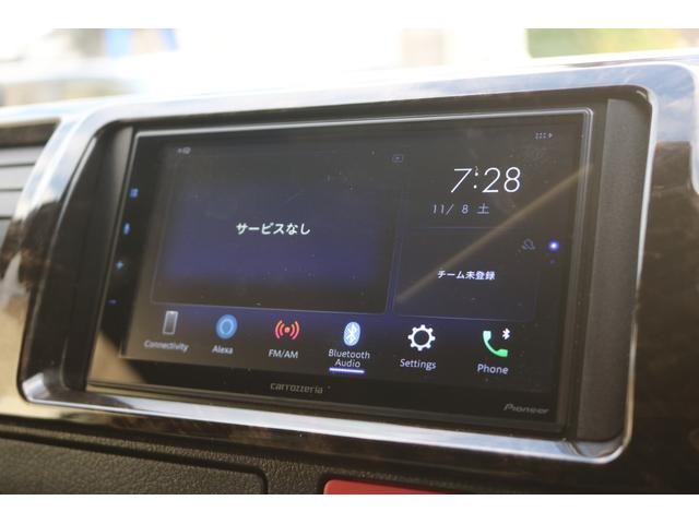 ハイエースバン スーパーＧＬ　ダークプライムＩＩ　カロッツェリアディスプレイオーディオＥＴＣ２．０フリップダウンモニタールーフスピーカーＦＬＥＸ１６インチアルミダンロップタイヤＴ－ＦｏｒｃｅスポイラーＦＬＥＸＬＥＤテールメッキ部マッドブラック塗装（3枚目）