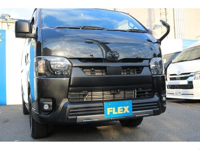 ハイエースバン スーパーＧＬ　ダークプライムＩＩ　カロッツェリアディスプレイオーディオＥＴＣ２．０フリップダウンモニタールーフスピーカーＦＬＥＸ１６インチアルミダンロップタイヤＴ－ＦｏｒｃｅスポイラーＦＬＥＸＬＥＤテールメッキ部マッドブラック塗装（6枚目）