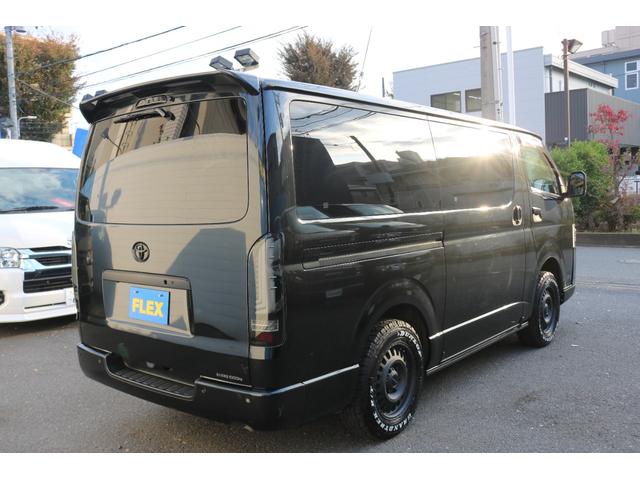 ハイエースバン スーパーＧＬ　ダークプライムＩＩ　カロッツェリアディスプレイオーディオＥＴＣ２．０フリップダウンモニタールーフスピーカーＦＬＥＸ１６インチアルミダンロップタイヤＴ－ＦｏｒｃｅスポイラーＦＬＥＸＬＥＤテールメッキ部マッドブラック塗装（11枚目）