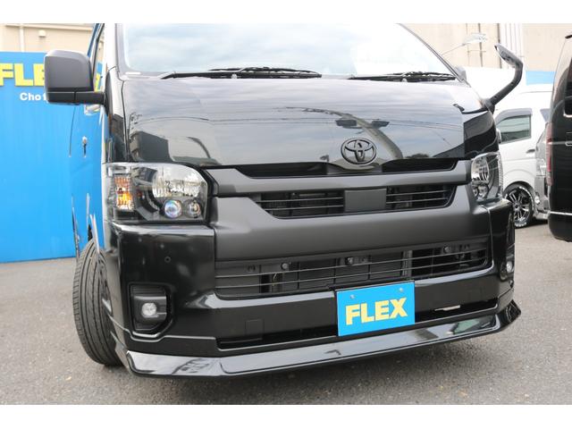 ハイエースワゴン ＧＬ　ロング　ＢＩＧ－ＸナビＥＴＣ２．０フリップダウンモニターＦＬＥＸインテリアパネルステアリングシートカバー床張り施工ＦＬＥＸ１７インチアルミナスカータイヤフロントスポイラーオーバーフェンダーＦＬＥＸテール（37枚目）