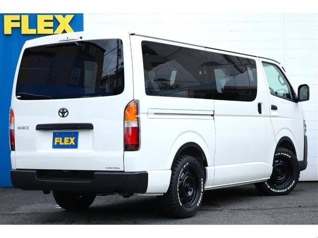 ハイエースバン ロングDX キャンピングWoodVillageメッキ部マッドブラック塗装FLEXテールシートカバーFLEX16インチアルミTOYOタイヤオーバーフェンダーT-Forcスポイラー床張り施工BIG-XナビETC2.0(8枚目)