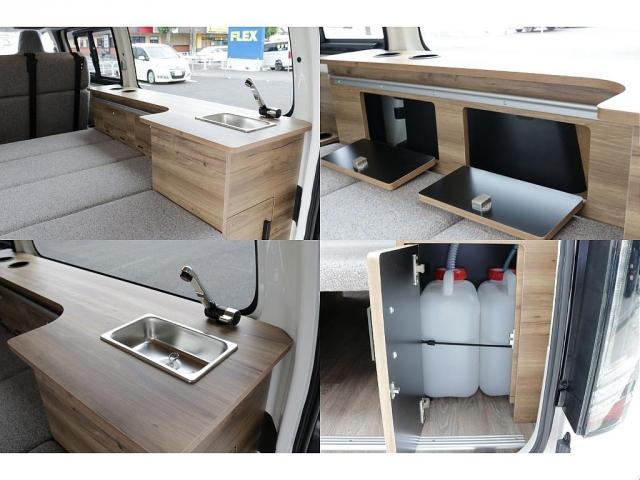 ハイエースバン ロングDX キャンピングWoodVillageメッキ部マッドブラック塗装FLEXテールシートカバーFLEX16インチアルミTOYOタイヤオーバーフェンダーT-Forcスポイラー床張り施工BIG-XナビETC2.0(10枚目)