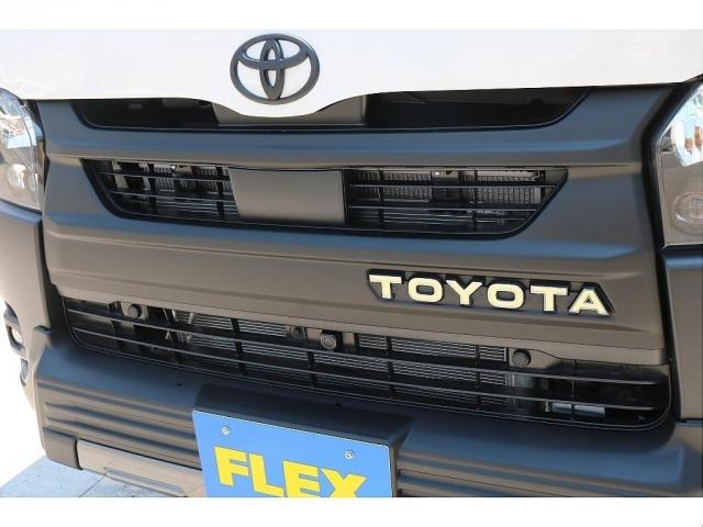 ハイエースバン ロングDX キャンピングWoodVillageメッキ部マッドブラック塗装FLEXテールシートカバーFLEX16インチアルミTOYOタイヤオーバーフェンダーT-Forcスポイラー床張り施工BIG-XナビETC2.0(16枚目)