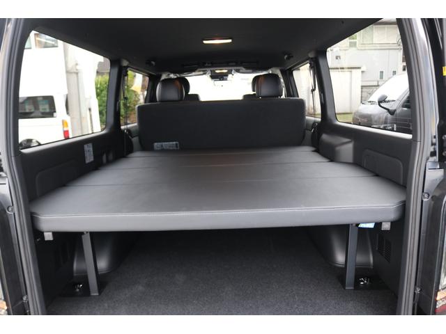 ハイエースバン スーパーＧＬ　ダークプライムＩＩ　アルパイン　ＢＩＧ－Ｘ１１インチナビメカレスＥＴＣ２．０ベッドキットＦＬＥＸボンネットフロントスポイラーオーバーフェンダーＬＥＤテールＦＬＥＸ１８インチアルミヨコハマタイヤメッキ部ブラック塗装（3枚目）