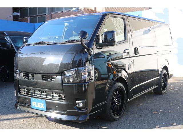 ハイエースバン スーパーＧＬ　ダークプライムＩＩ　アルパイン　ＢＩＧ－Ｘ１１インチナビメカレスＥＴＣ２．０ベッドキットＦＬＥＸボンネットフロントスポイラーオーバーフェンダーＬＥＤテールＦＬＥＸ１８インチアルミヨコハマタイヤメッキ部ブラック塗装（7枚目）