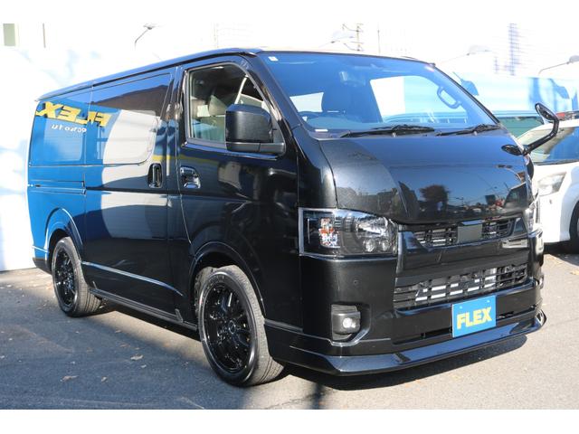 ハイエースバン スーパーＧＬ　ダークプライムＩＩ　アルパイン　ＢＩＧ－Ｘ１１インチナビメカレスＥＴＣ２．０ベッドキットＦＬＥＸボンネットフロントスポイラーオーバーフェンダーＬＥＤテールＦＬＥＸ１８インチアルミヨコハマタイヤメッキ部ブラック塗装（8枚目）