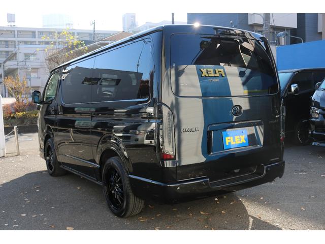 ハイエースバン スーパーＧＬ　ダークプライムＩＩ　アルパイン　ＢＩＧ－Ｘ１１インチナビメカレスＥＴＣ２．０ベッドキットＦＬＥＸボンネットフロントスポイラーオーバーフェンダーＬＥＤテールＦＬＥＸ１８インチアルミヨコハマタイヤメッキ部ブラック塗装（9枚目）