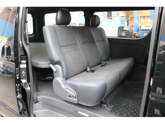 ハイエースバン スーパーＧＬ　ダークプライムＩＩ　アルパイン　ＢＩＧ－Ｘ１１インチナビメカレスＥＴＣ２．０ベッドキットＦＬＥＸボンネットフロントスポイラーオーバーフェンダーＬＥＤテールＦＬＥＸ１８インチアルミヨコハマタイヤメッキ部ブラック塗装（13枚目）