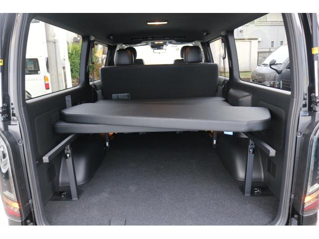 ハイエースバン スーパーＧＬ　ダークプライムＩＩ　アルパイン　ＢＩＧ－Ｘ１１インチナビメカレスＥＴＣ２．０ベッドキットＦＬＥＸボンネットフロントスポイラーオーバーフェンダーＬＥＤテールＦＬＥＸ１８インチアルミヨコハマタイヤメッキ部ブラック塗装（15枚目）
