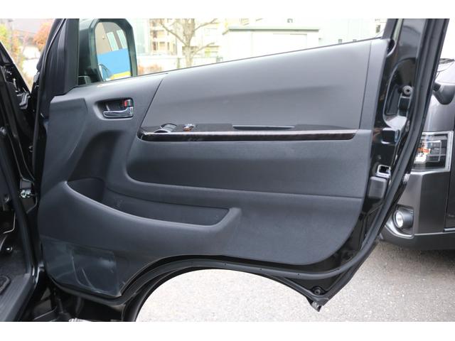 ハイエースバン スーパーＧＬ　ダークプライムＩＩ　アルパイン　ＢＩＧ－Ｘ１１インチナビメカレスＥＴＣ２．０ベッドキットＦＬＥＸボンネットフロントスポイラーオーバーフェンダーＬＥＤテールＦＬＥＸ１８インチアルミヨコハマタイヤメッキ部ブラック塗装（20枚目）