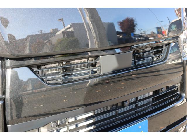 ハイエースバン スーパーＧＬ　ダークプライムＩＩ　アルパイン　ＢＩＧ－Ｘ１１インチナビメカレスＥＴＣ２．０ベッドキットＦＬＥＸボンネットフロントスポイラーオーバーフェンダーＬＥＤテールＦＬＥＸ１８インチアルミヨコハマタイヤメッキ部ブラック塗装（24枚目）