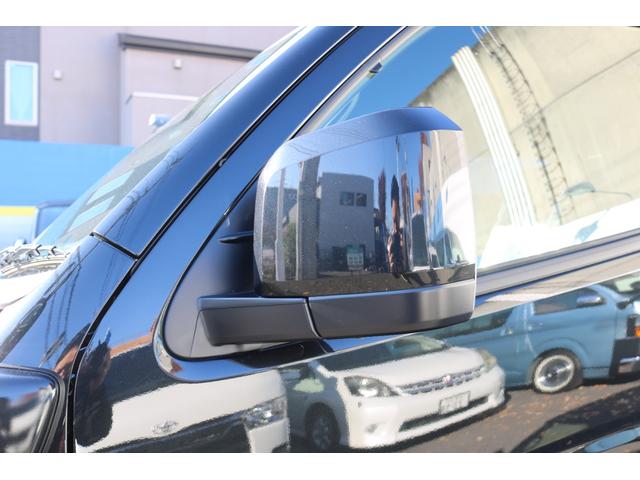 ハイエースバン スーパーＧＬ　ダークプライムＩＩ　アルパイン　ＢＩＧ－Ｘ１１インチナビメカレスＥＴＣ２．０ベッドキットＦＬＥＸボンネットフロントスポイラーオーバーフェンダーＬＥＤテールＦＬＥＸ１８インチアルミヨコハマタイヤメッキ部ブラック塗装（27枚目）