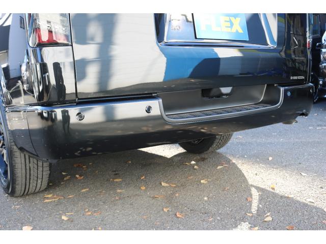 ハイエースバン スーパーＧＬ　ダークプライムＩＩ　アルパイン　ＢＩＧ－Ｘ１１インチナビメカレスＥＴＣ２．０ベッドキットＦＬＥＸボンネットフロントスポイラーオーバーフェンダーＬＥＤテールＦＬＥＸ１８インチアルミヨコハマタイヤメッキ部ブラック塗装（30枚目）